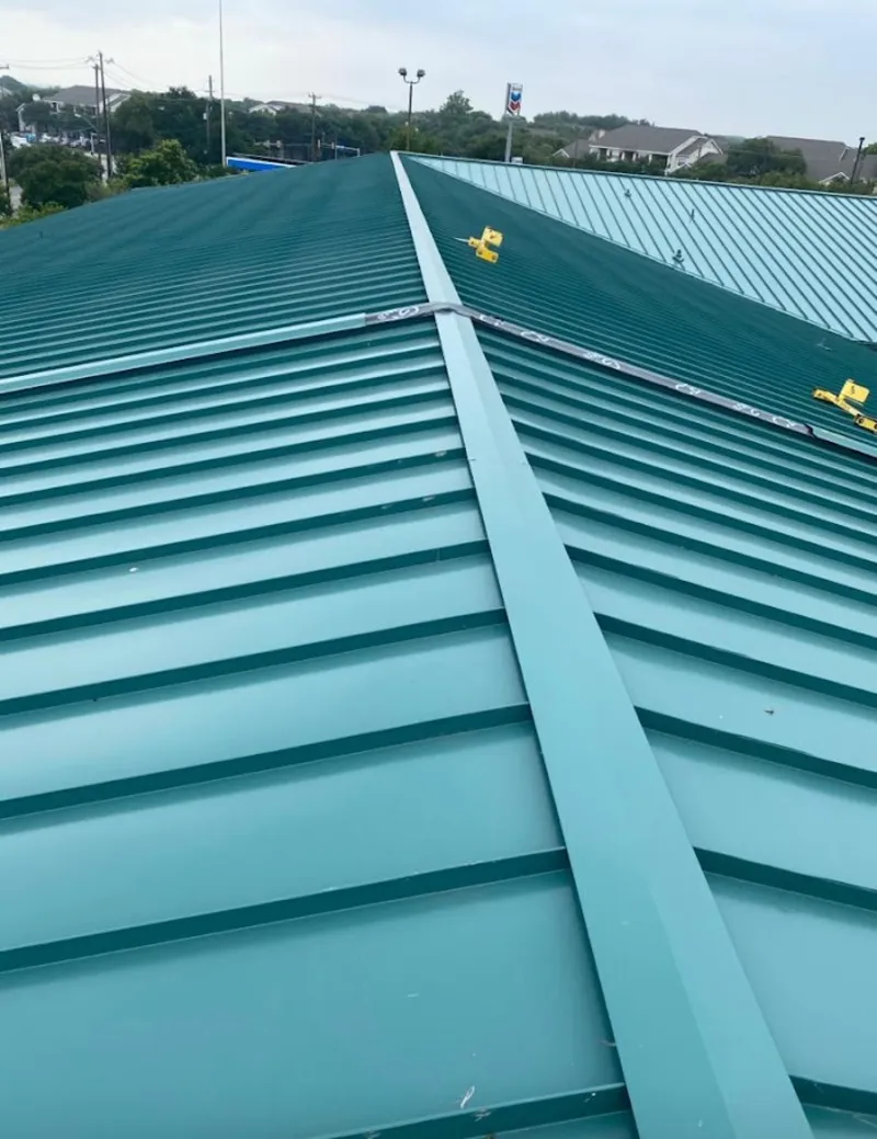 Green commercial metal roof ridge and valley for Metal Roof Repair in Clarksville